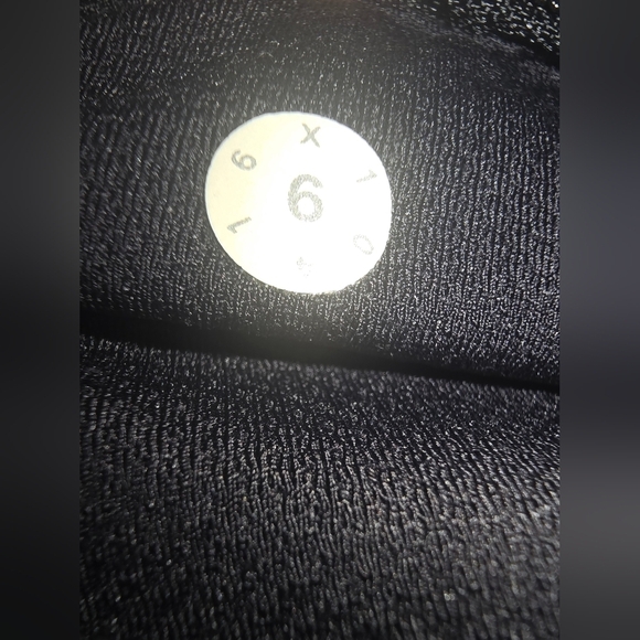 Lululemon Black Leggings with Mesh panels on  legs, Size 6 - Picture 6 of 7